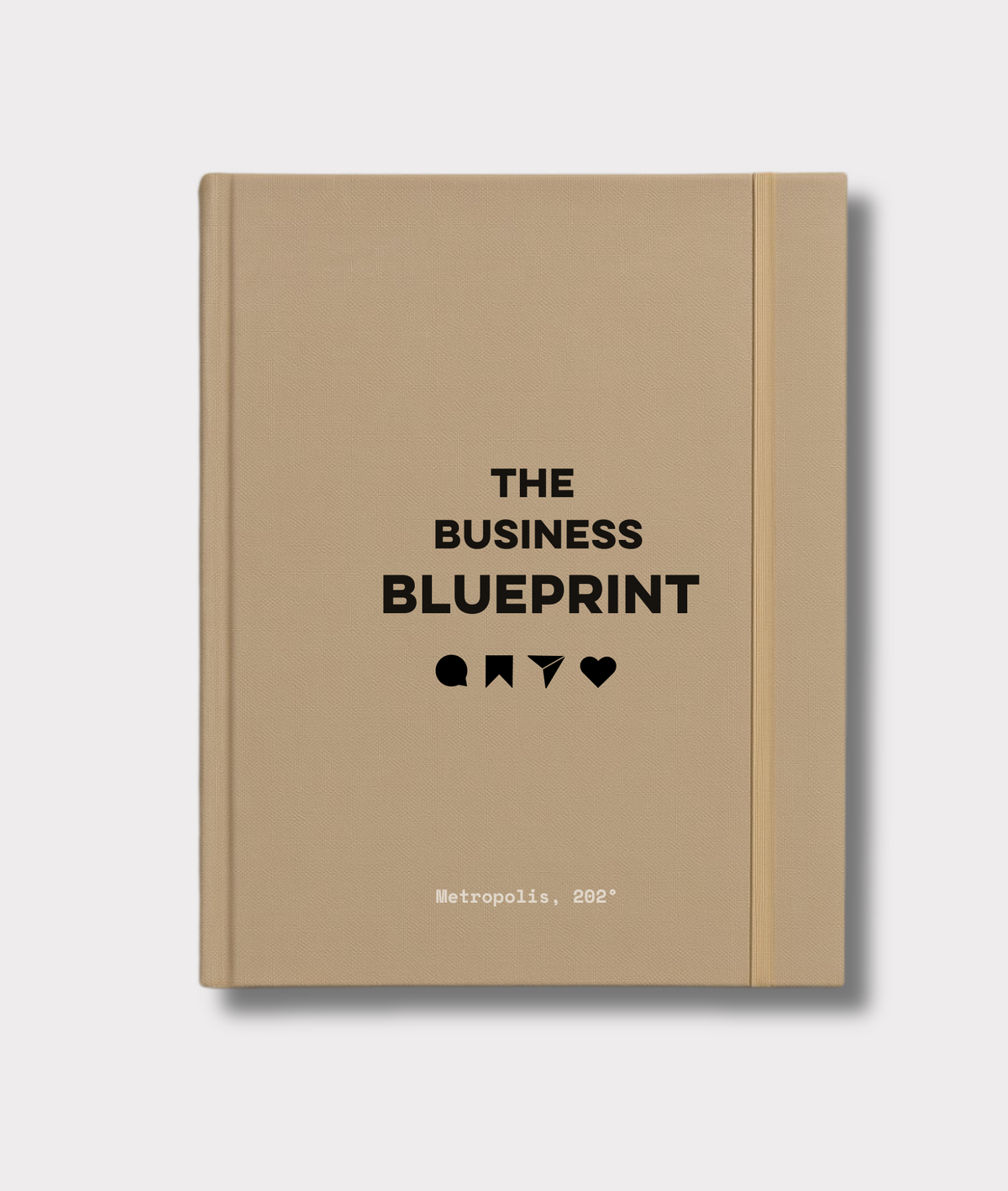 Tan book titled 'The Business Blueprint' 